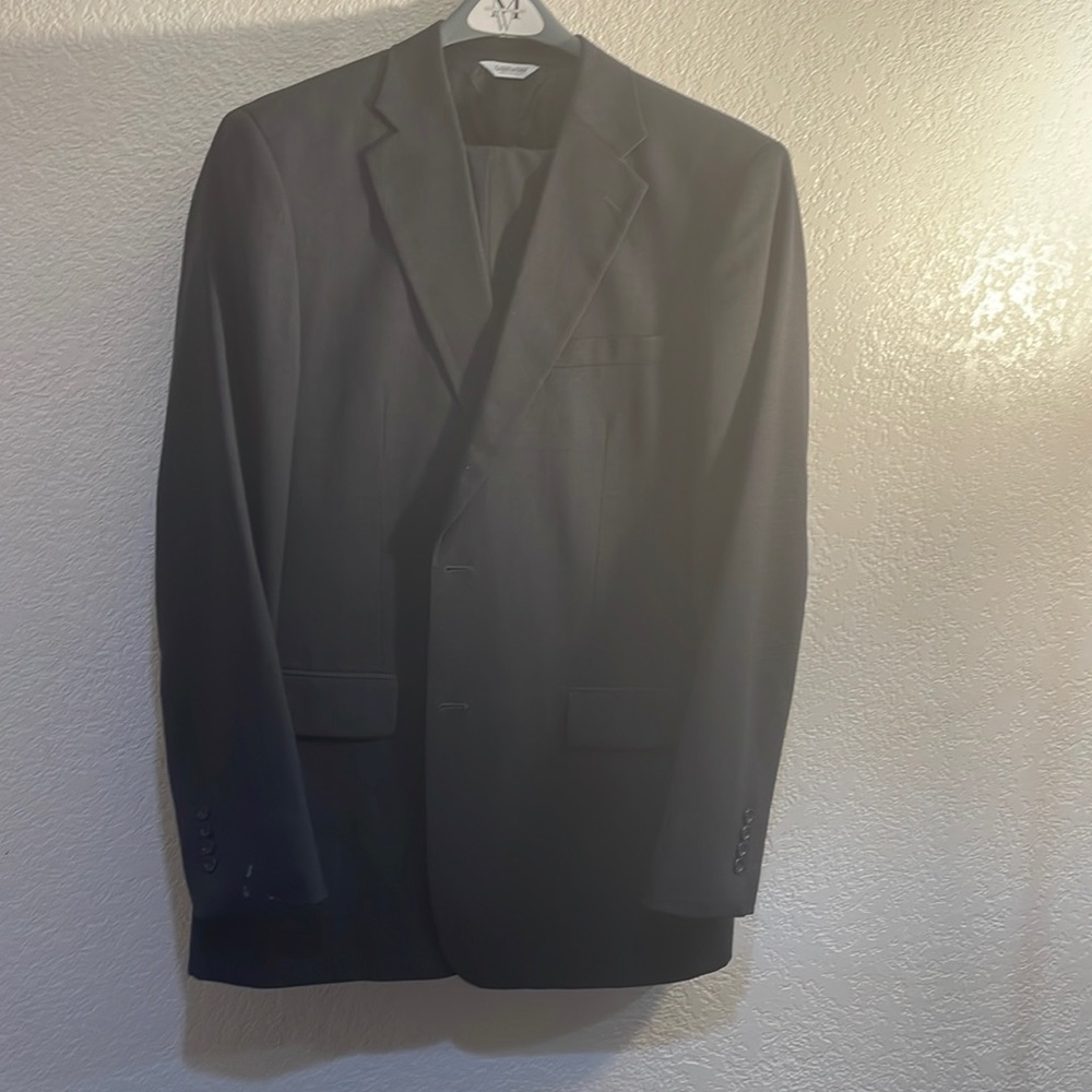 Men’s suits Joseph and Feiss.  gently used. Color dark gray